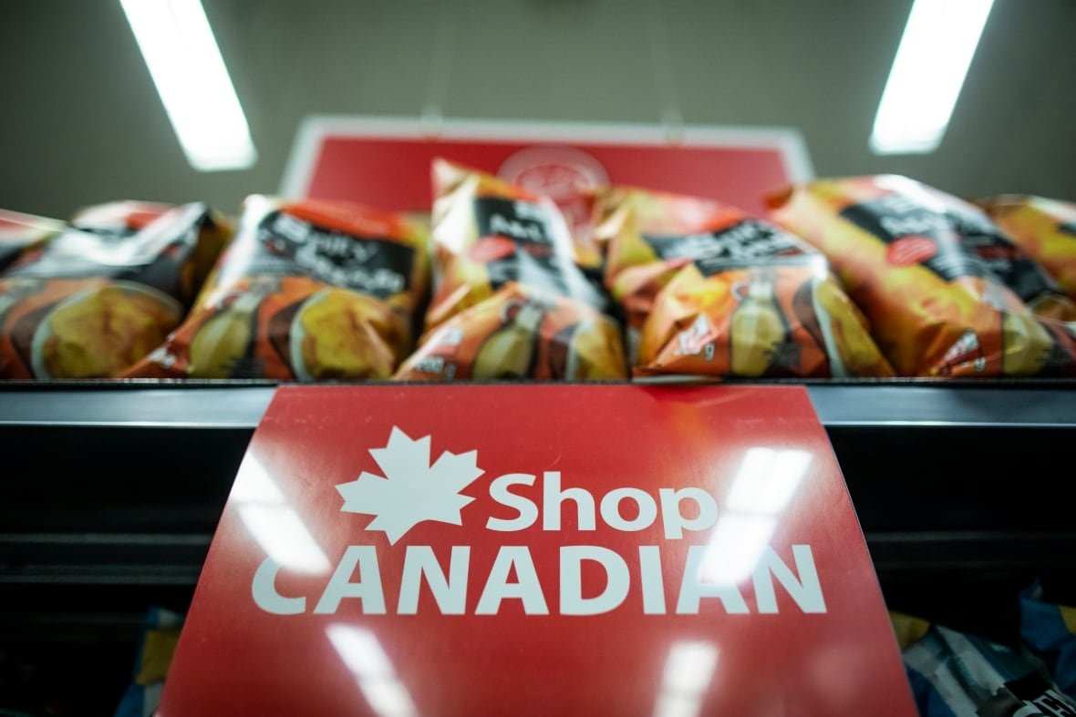 made-in-canada-2 Grocery products that are made in Canada are pictured on shelves at a supermarket in Vancouver, B.C., Friday, Feb. 28, 2025.
