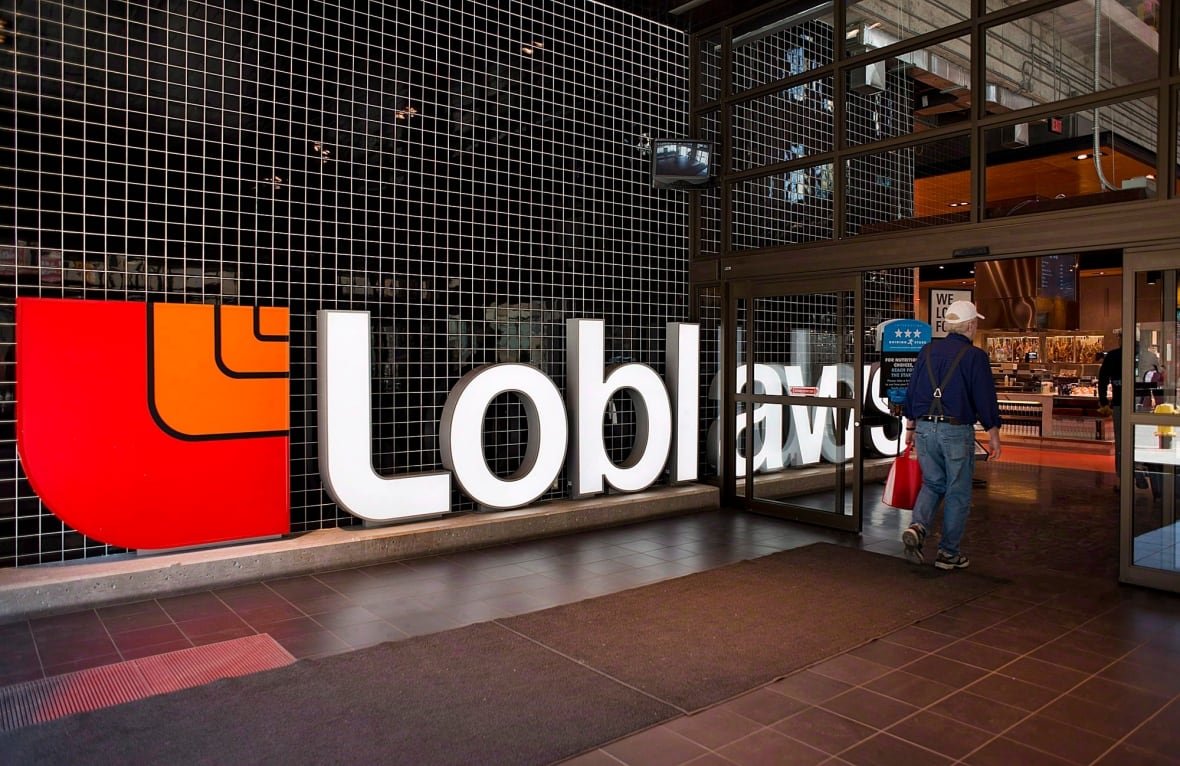 cda-grocers-profits-20221103-1 A Loblaws sign is seen outside of a grocery store.