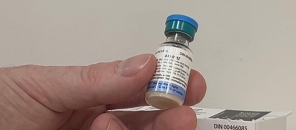 measles-vaccine-in-dartmouth A tiny bottle in someone's hand