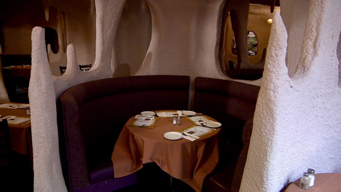 the-cave-1 Photo of a restaurant table inside a circular cave