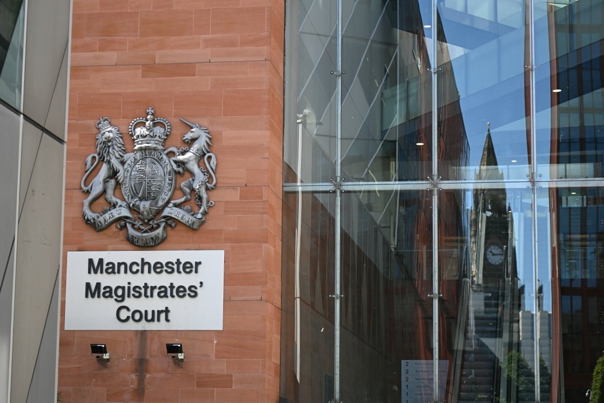 2214752691 Extertior of Manchester Magistrates' Court, red bricks on left and windows on right