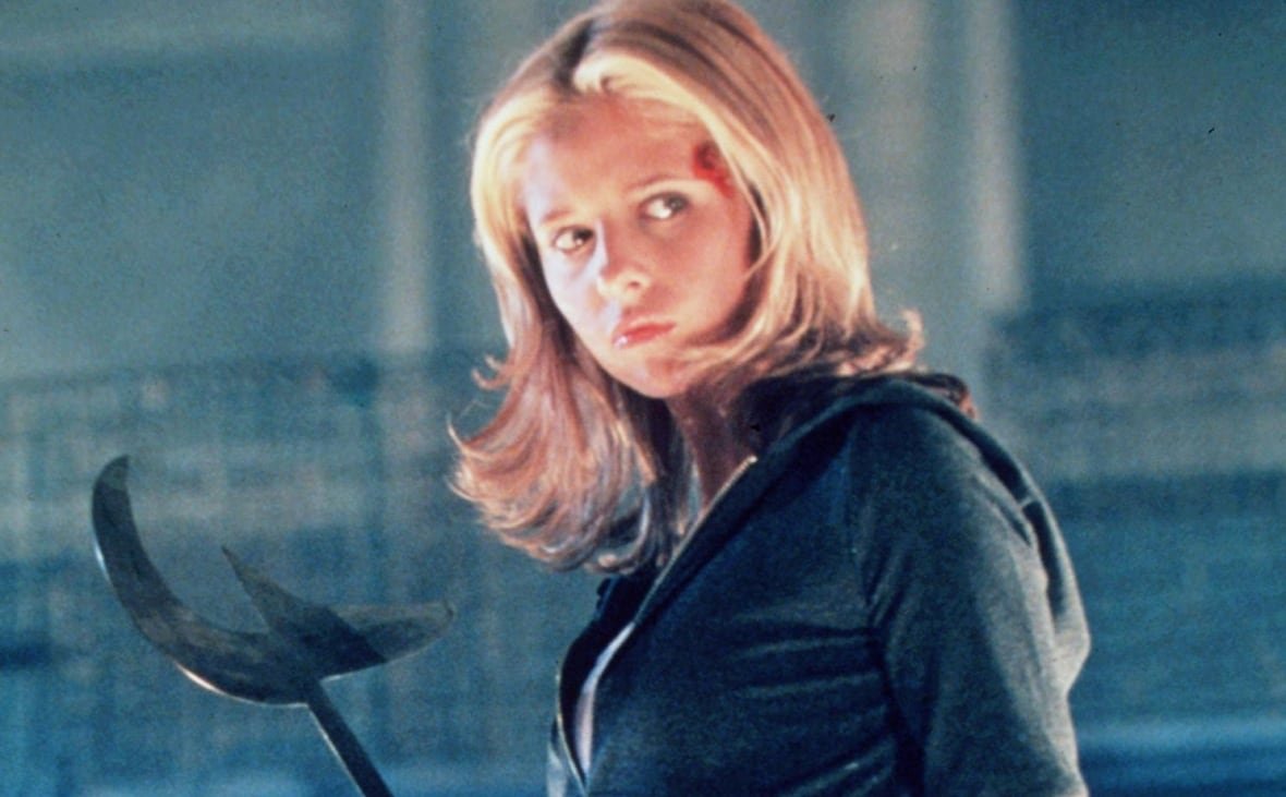 A woman holding a weapon