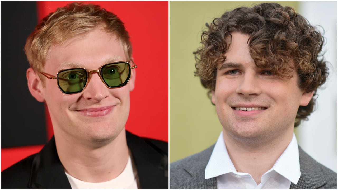 default-355 A composite shows two smiling young men: one with short blond hair wearing green-tinted glasses (left) and a curly haired man in a blazer (right).